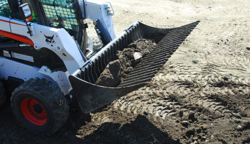 Puinbak bobcat vangaever 1