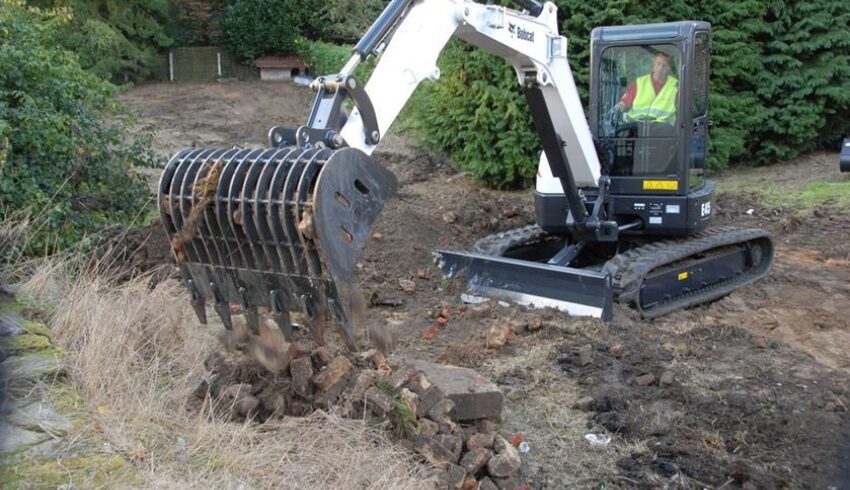 Puinbak graafmachine bobcat vangaever 2